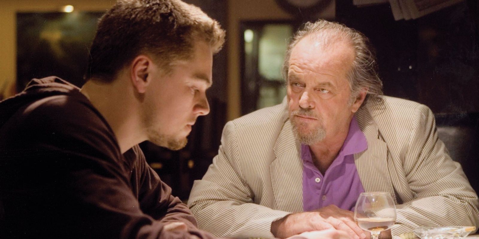 Costigan and Frank in conversation in a bar in The Departed