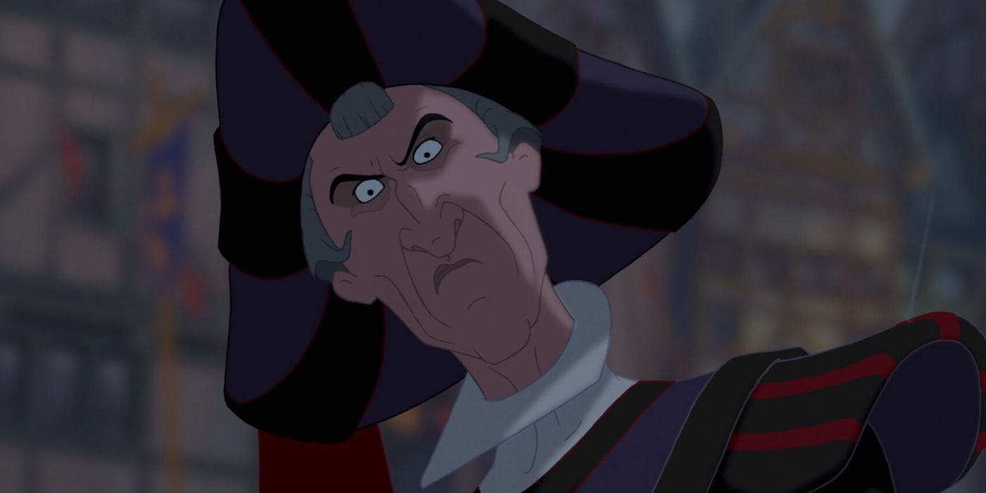 Frollo loooking at Quasimodo with anger and hatred