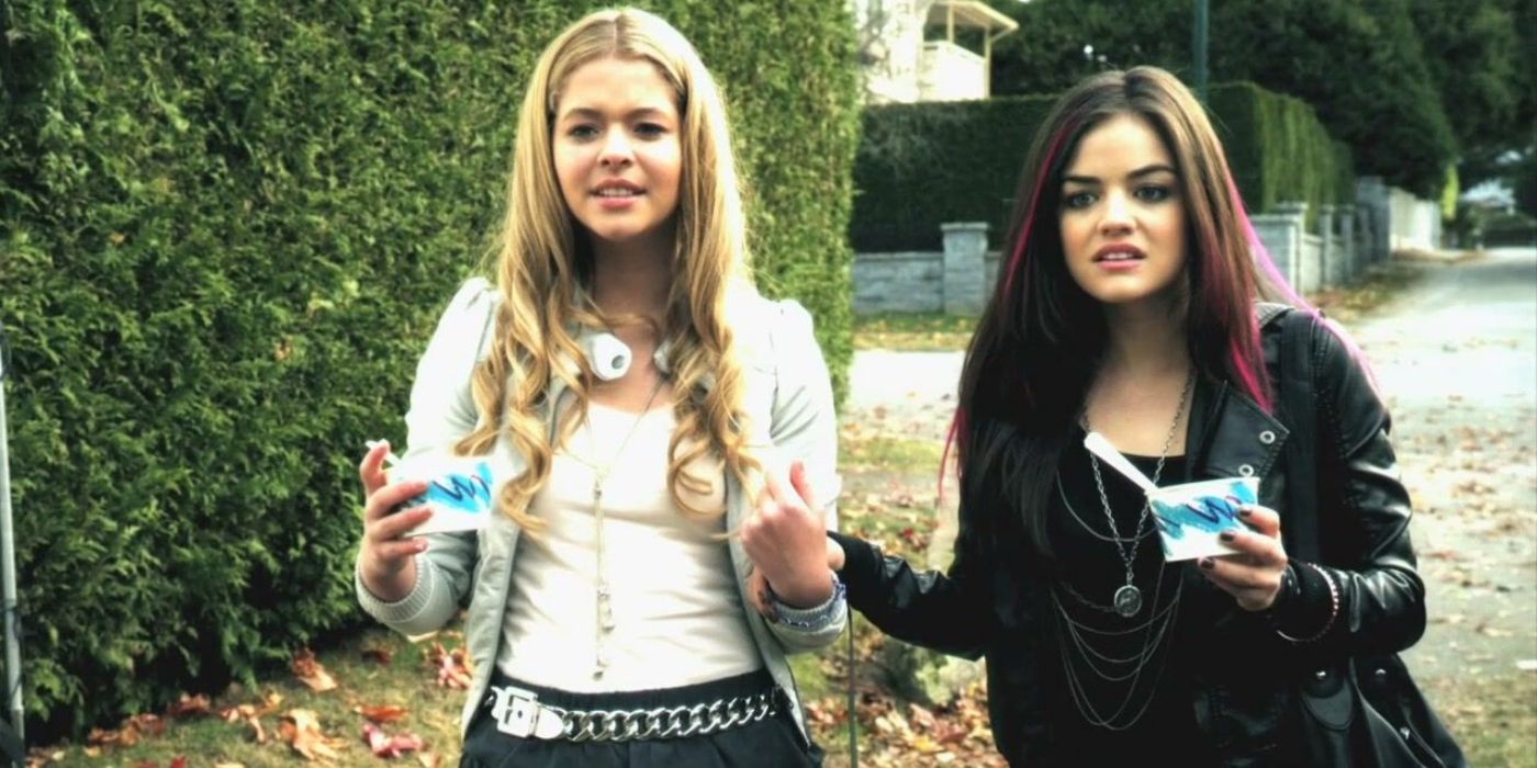 Ali and Aria walking outside and holding ice cream cups on Pretty Little Liars