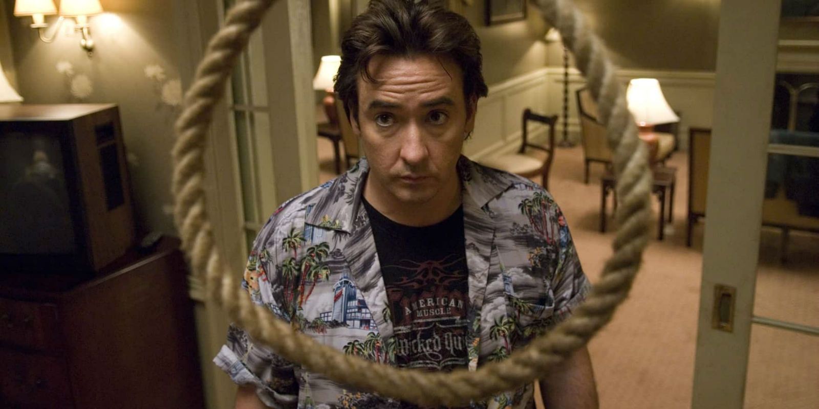John Cusack looks alarmingly at a hanging noose in his hotel room in 1408.