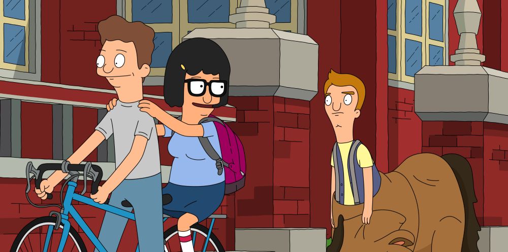 Tina rides on a boys bike while looking at Jimmy Jr. from Bob's Burgers 