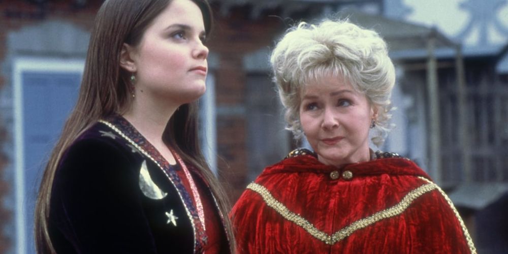 Marnie and Aggie looking serious in conversation in Halloweentown II