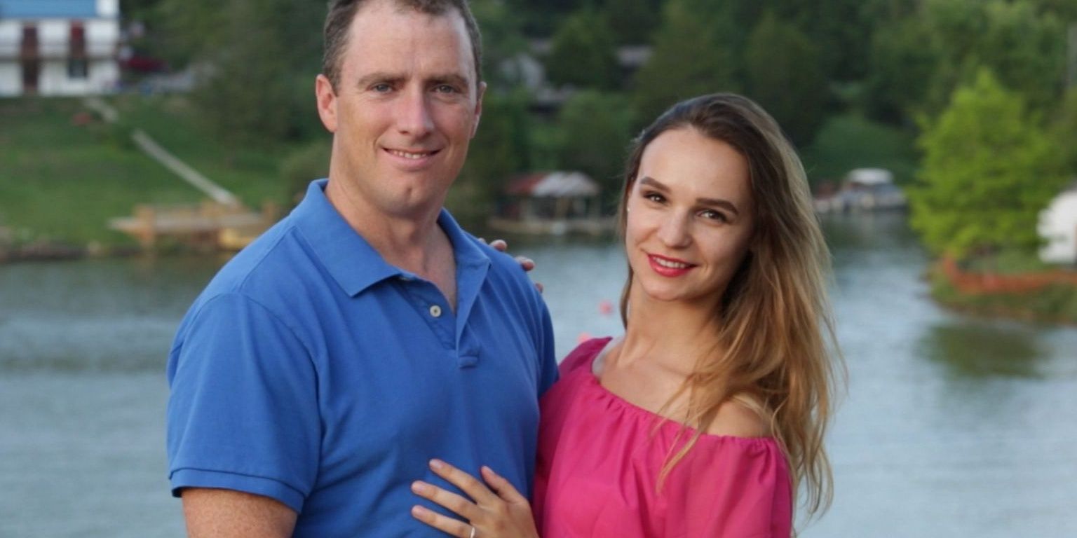 90 Day Fiance Matt and Alla pose in front of a lake.