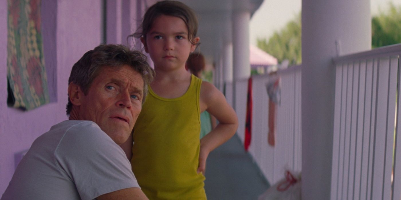 Brooklynn Prince and Willem Dafoe look on in The Florida Project 