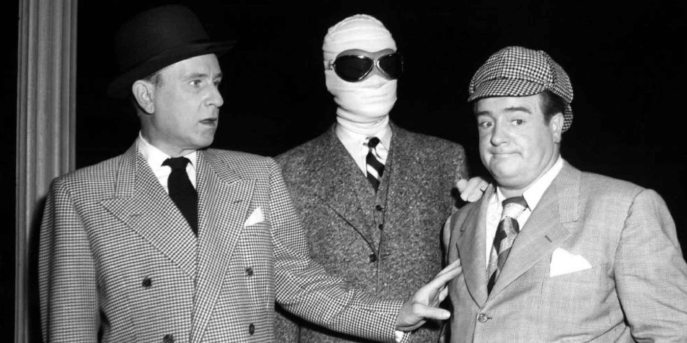 Abbott and Costello stand with the invisible man 