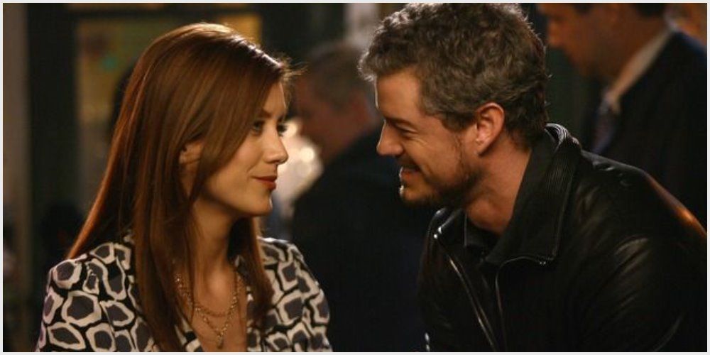 Mark and Addison in Joe's bar. They are sitting close to each other and smiling
