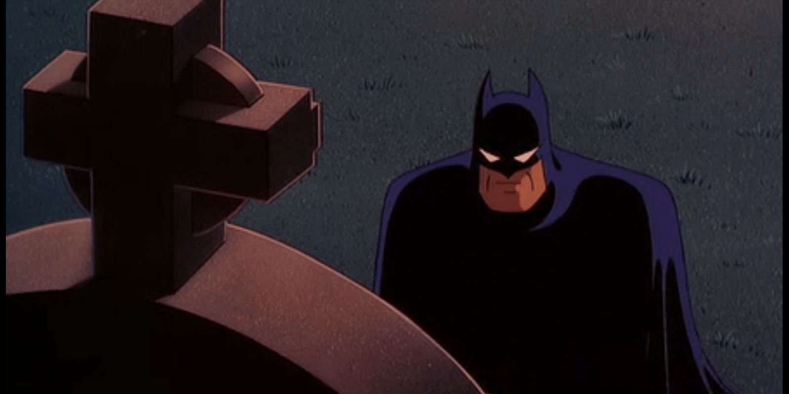 Batman looks at his mother’s grave in Batman: The Mask of Phantasm