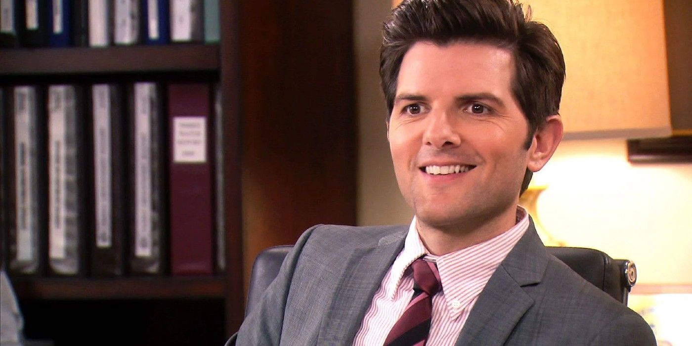 Ben Wyatt smiling in his office on Parks and Rec