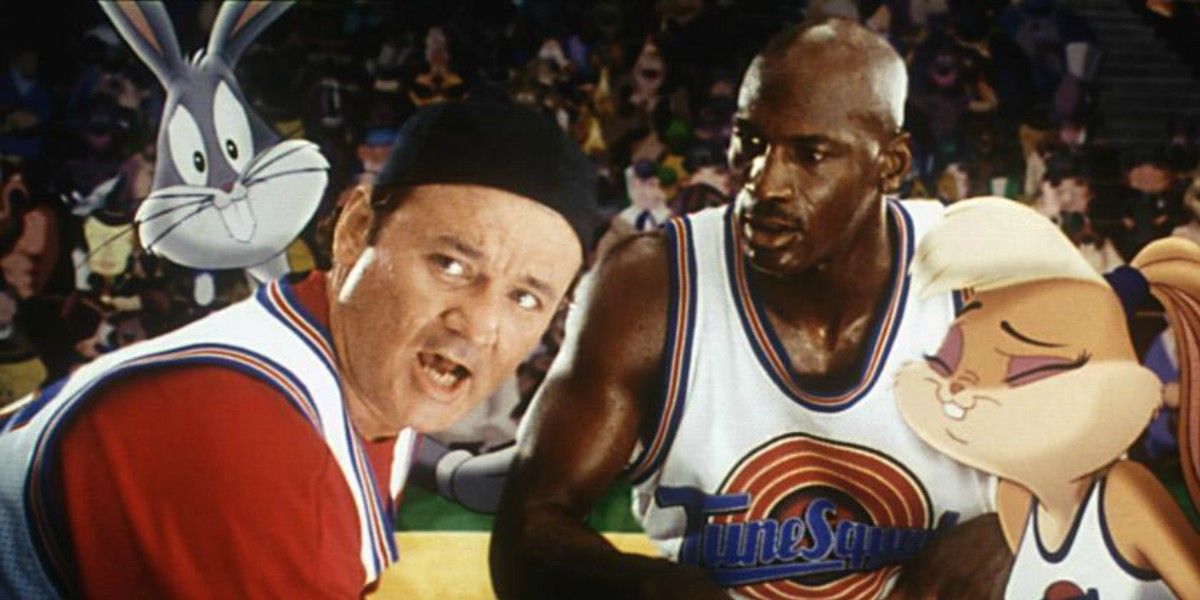 Michael Jordan, Billy Murray, Bugs, and Lola Bunny huddle up in Space Jam