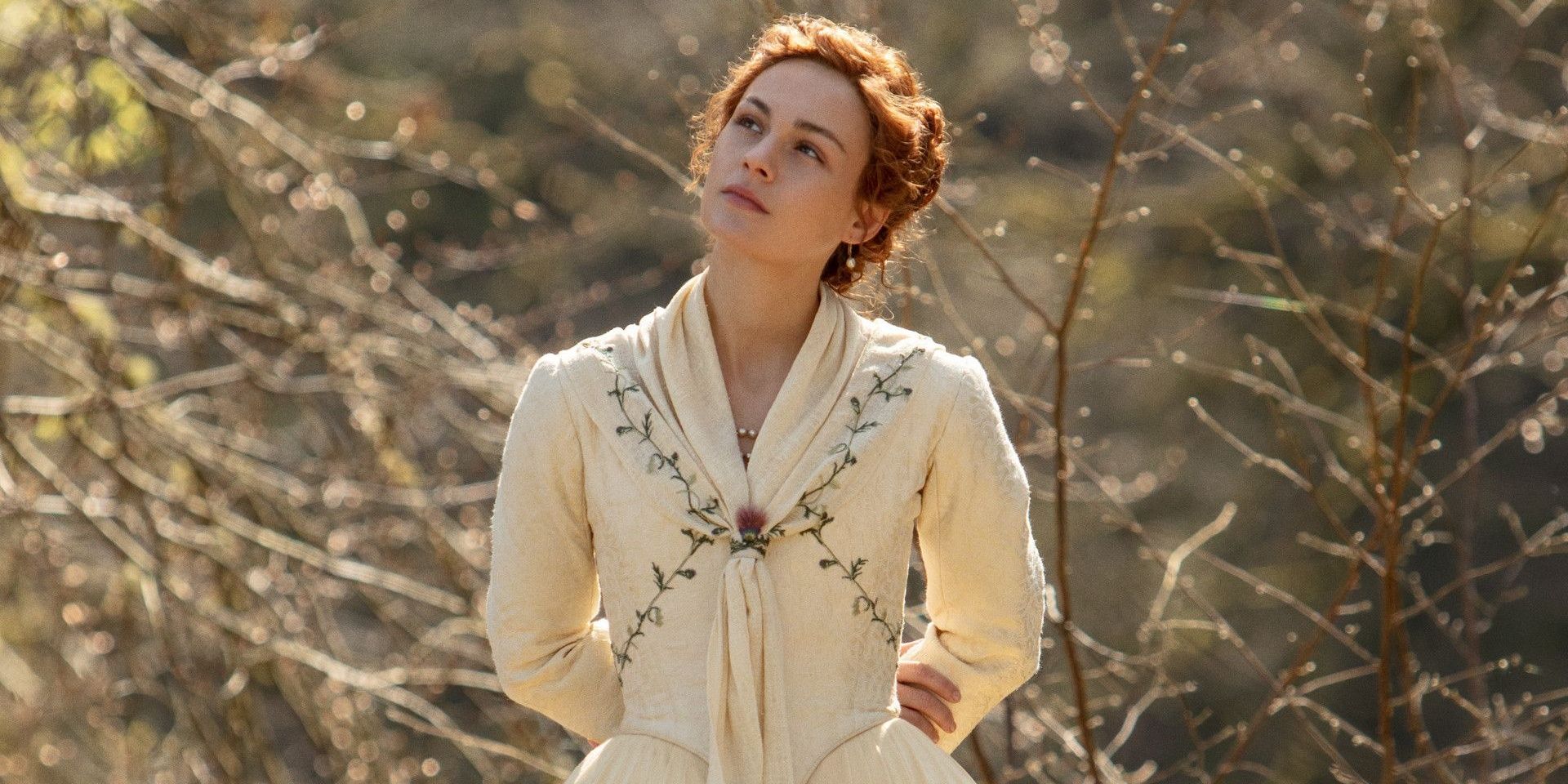 Brianna looks on in her wedding dress in Outlander 