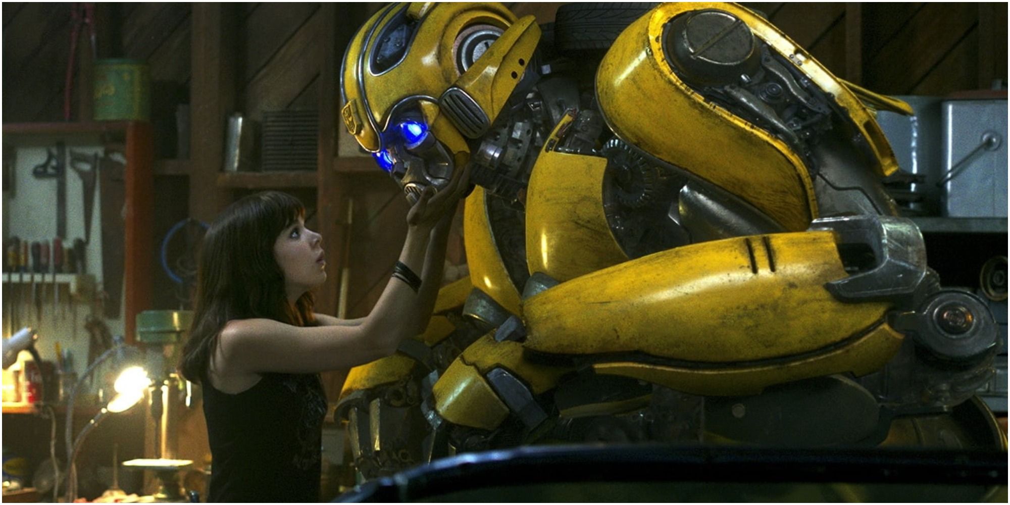 Charlie and Bumblebee in the 2018 Transformers movie Bumblebee