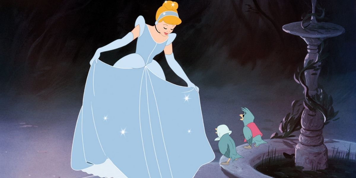 Cinderella looks at her dress