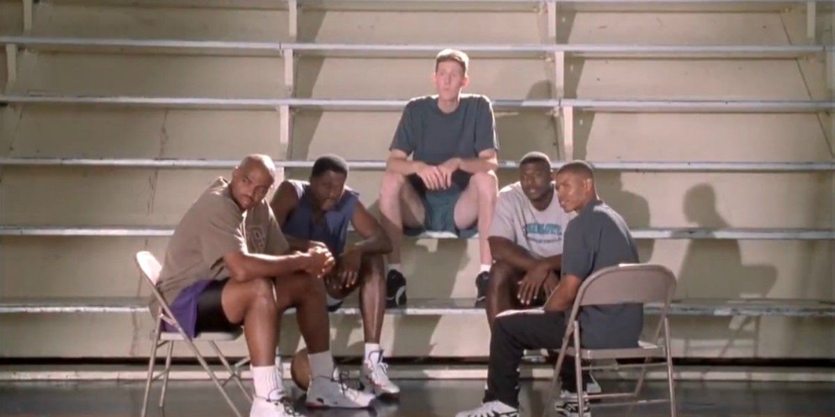 NBA players sitting on bleacher in Space Jam