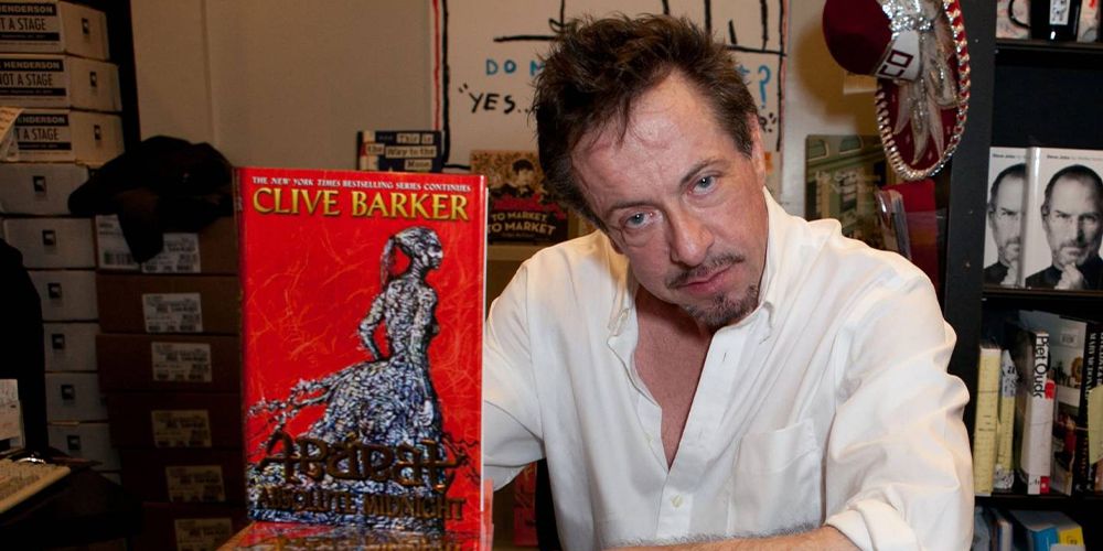 Clive Barker with his books.