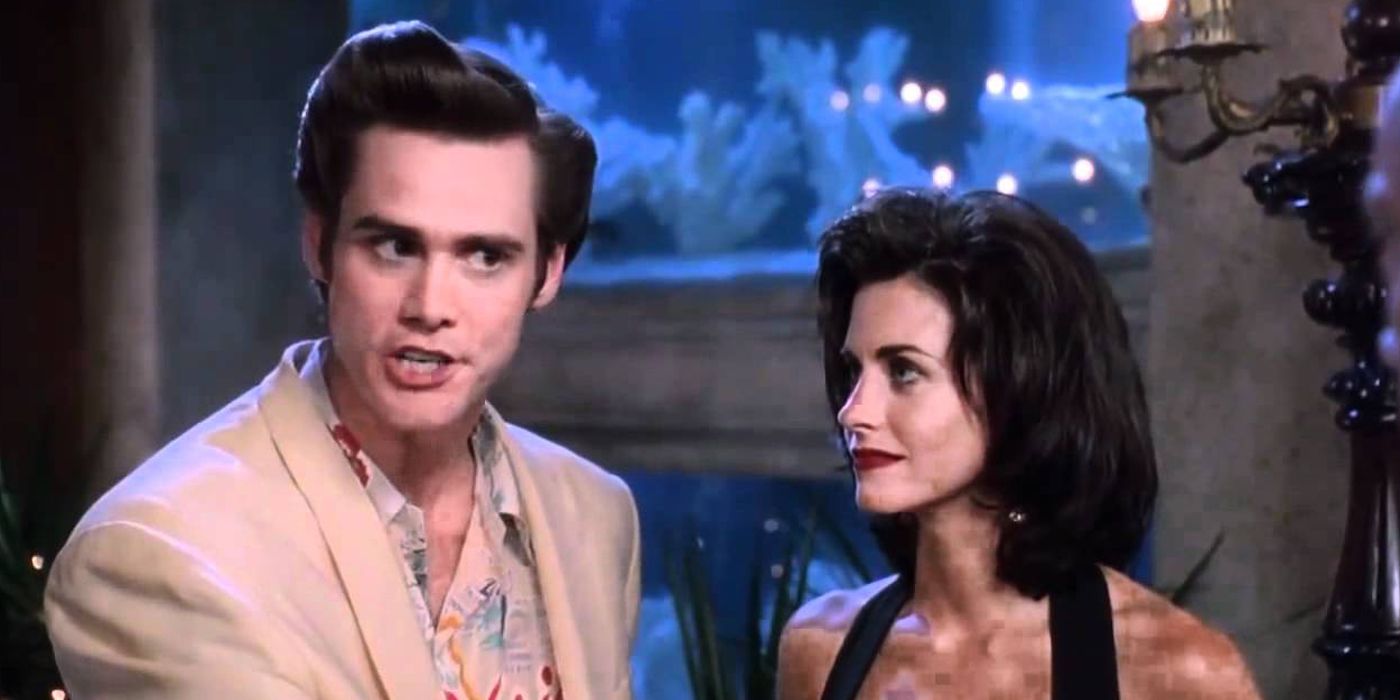 Ace (Jim Carey) and Melissa (Courtney Cox) at a party in Ace Ventura Pet Detective