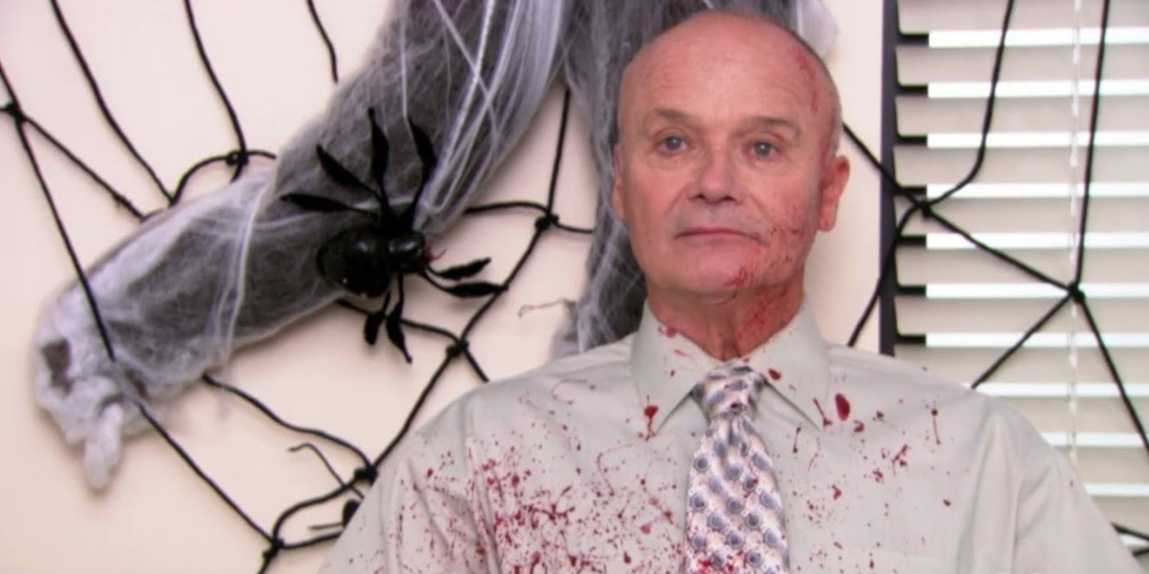 Creed Bratton with a bloody shirt in the Office