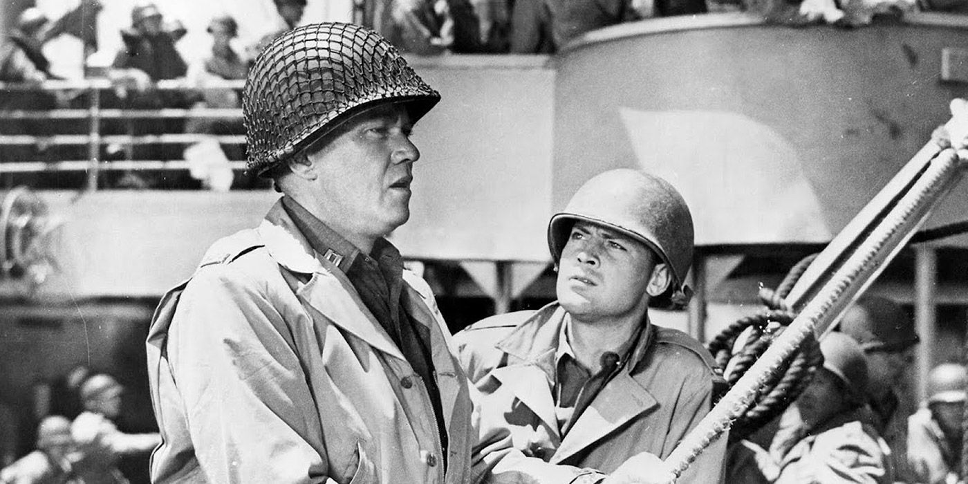 Two soldiers talk on board a naval ship in Breakthrough