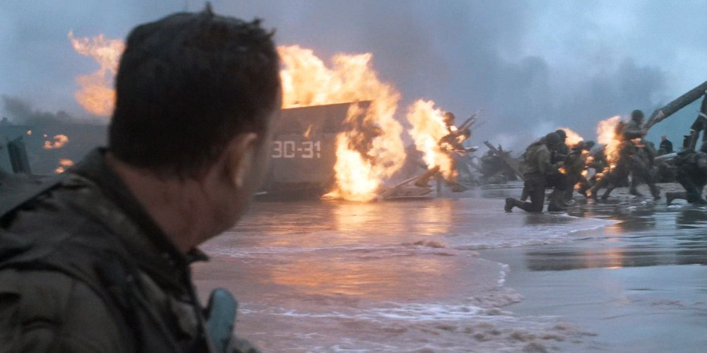 Captain Miller watches in horror as his men run from their boats on fire in Saving Private Ryan