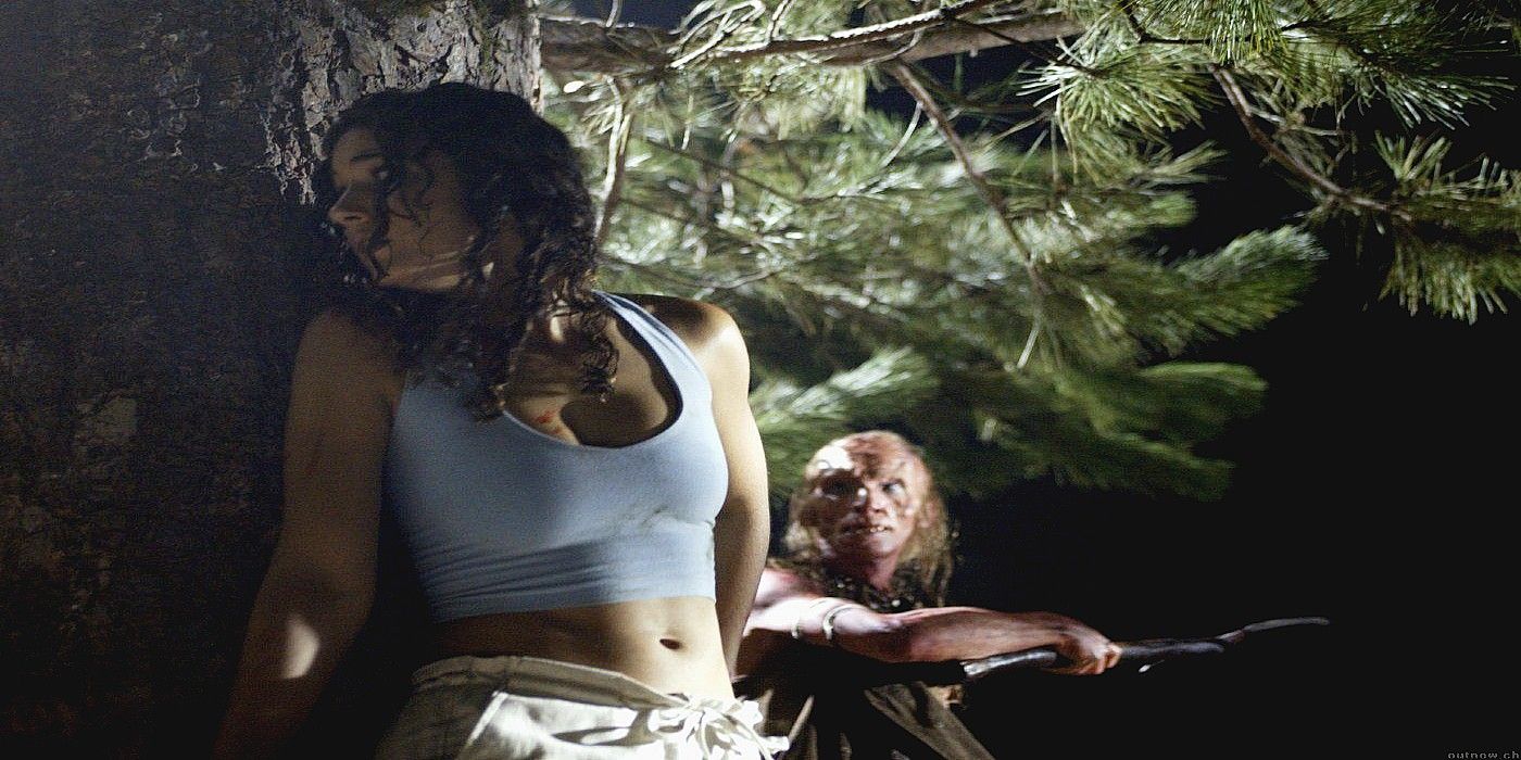 Three-Finger swinging ax at Emmauelle Chriqui in Wrong Turn.