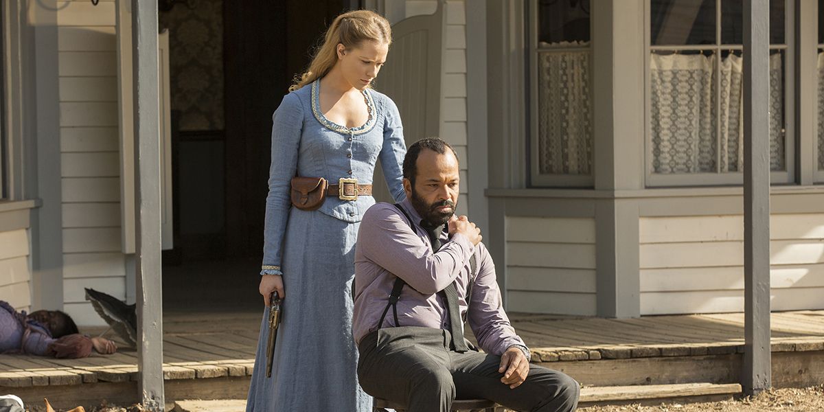 Jeffrey Wright sits and is comforted in Westworld
