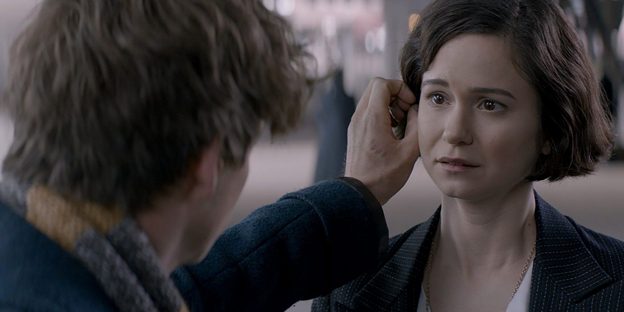 New Scamander touches Tina's hair in Fantastic Beasts