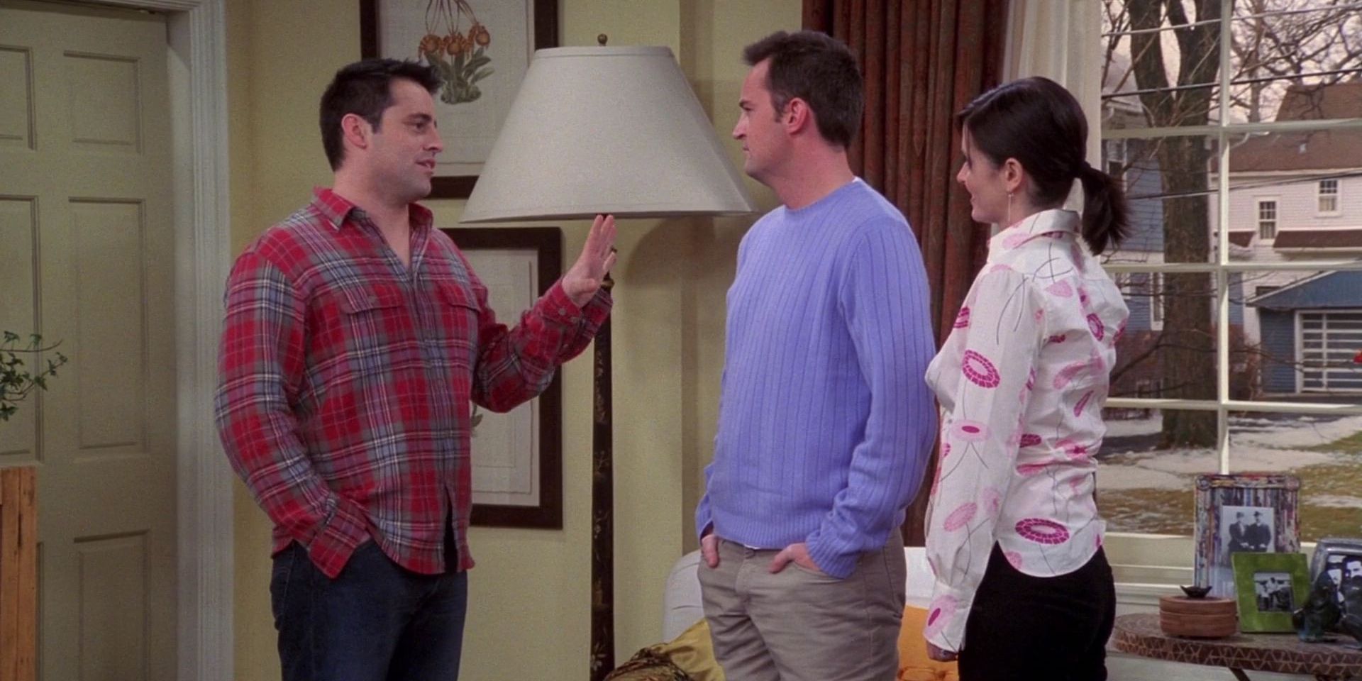 Joey, Chandler, and Monica talk in Friends.