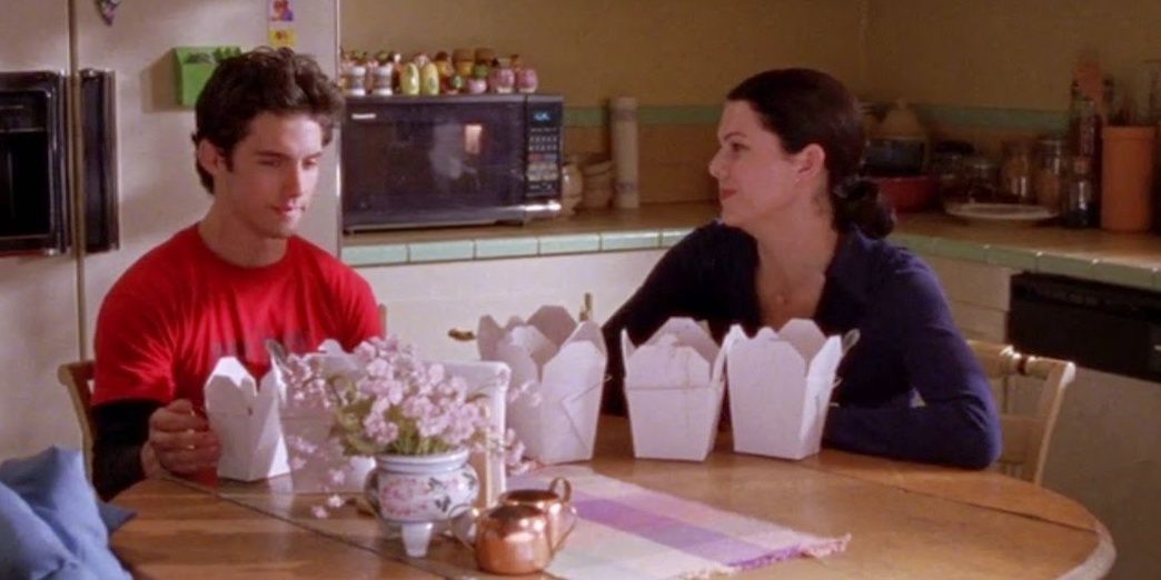Jess and Lorelai with Chinese food in Gilmore Girls