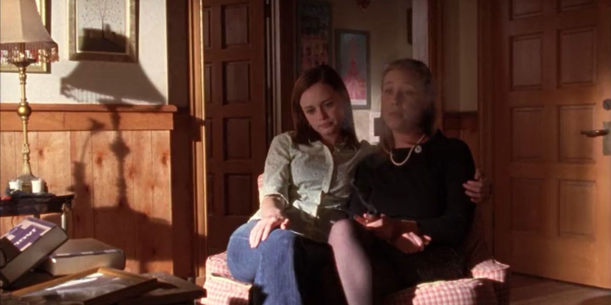 Rory and Paris sitting together on Gilmore GIrls
