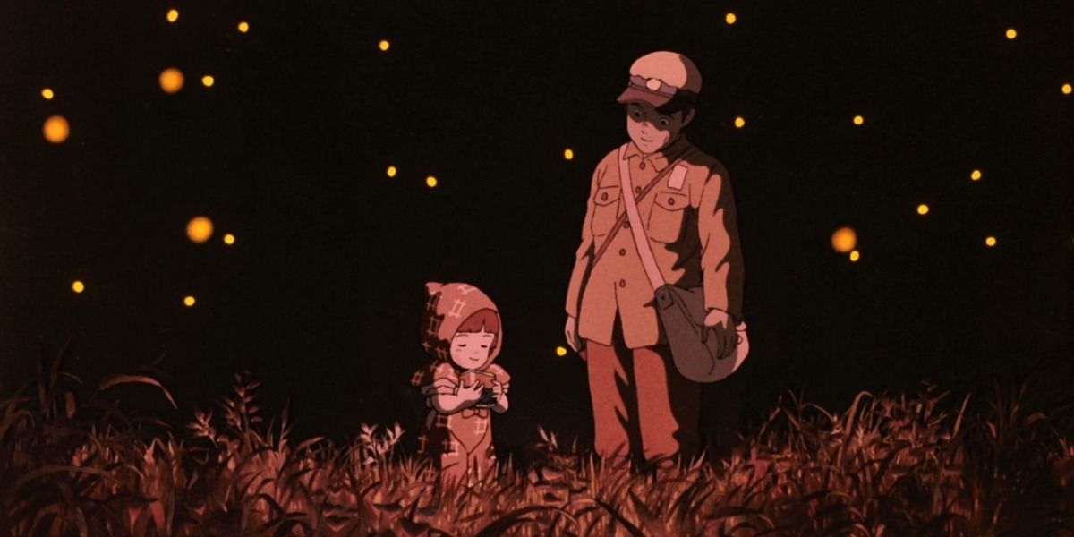 Seita and Setsuko standing in a field in Grave of the Fireflies.