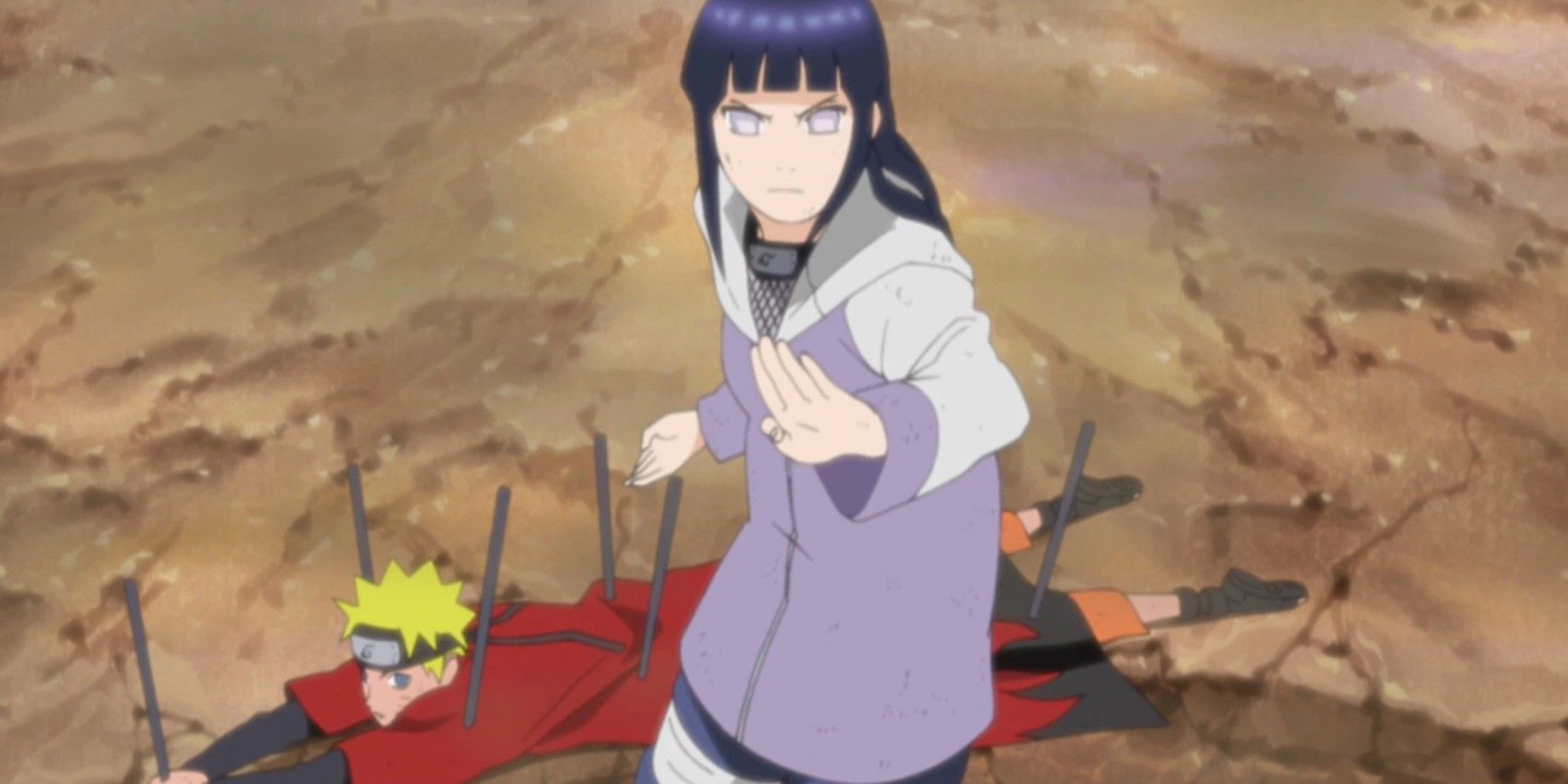 Hinata protects Naruto after he's pinned by Pain in Naruto: Shippuden
