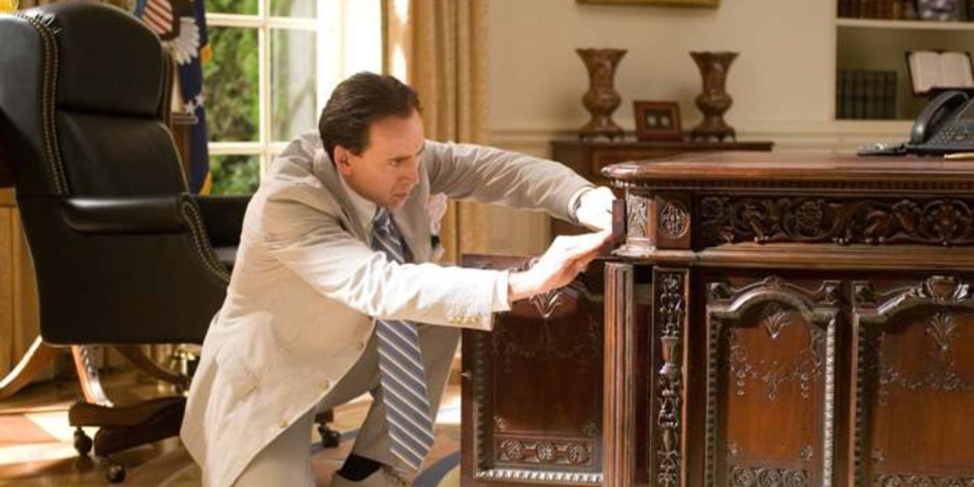 Ben inspects the Presidents desk in National Treasure