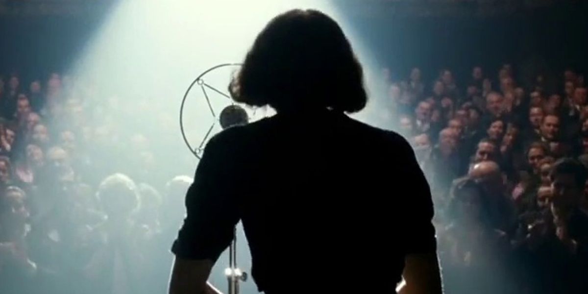 Marion Cotillard performing behind a microphone in La Vie En Rose