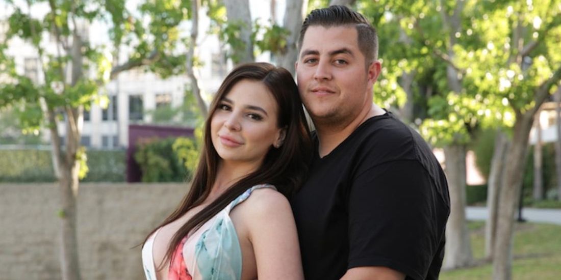 Jorge and Anfisa posing together in the TLC series 90 Day Fiance.
