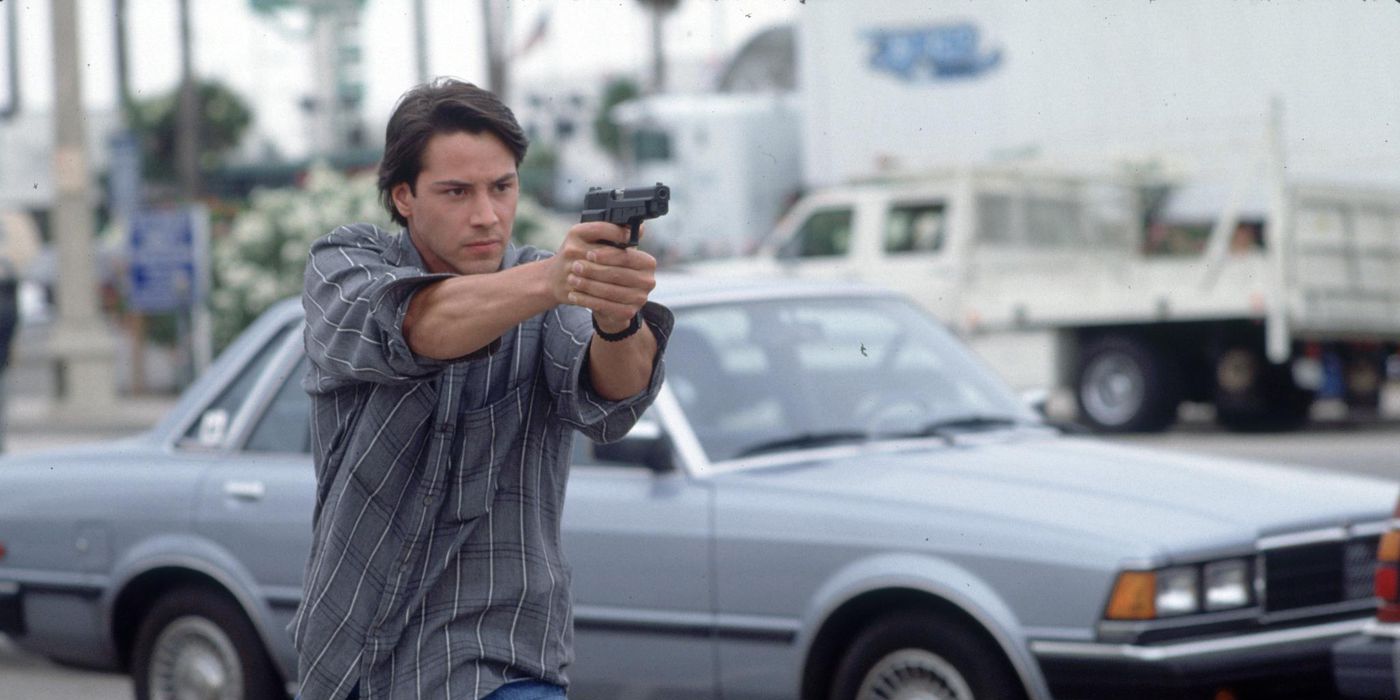 Johnny pointing a gun in Point Break