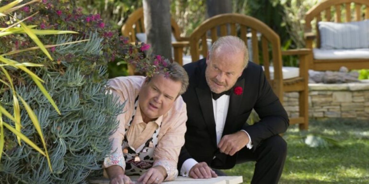 Keifth and Cam hiding in bushes on Modern Family