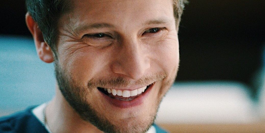 Matt Czuchry as Dr. Conrad Hawkins smiling in The Resident