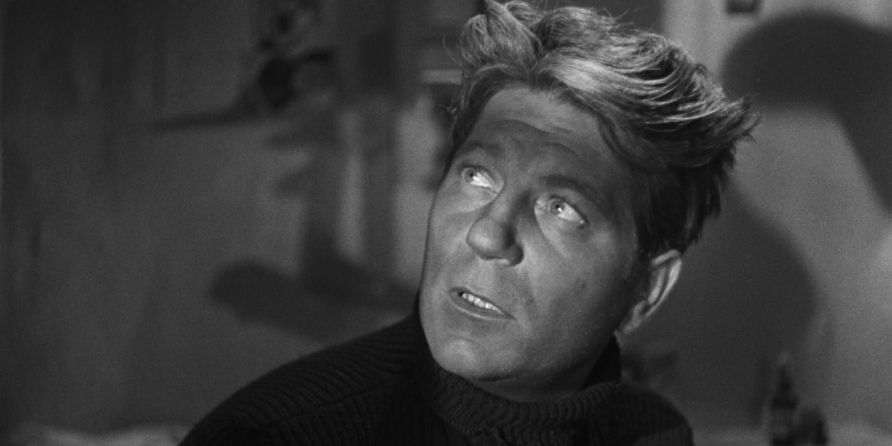 Jean Gabin looking at something in surprise in The Grand Illusion