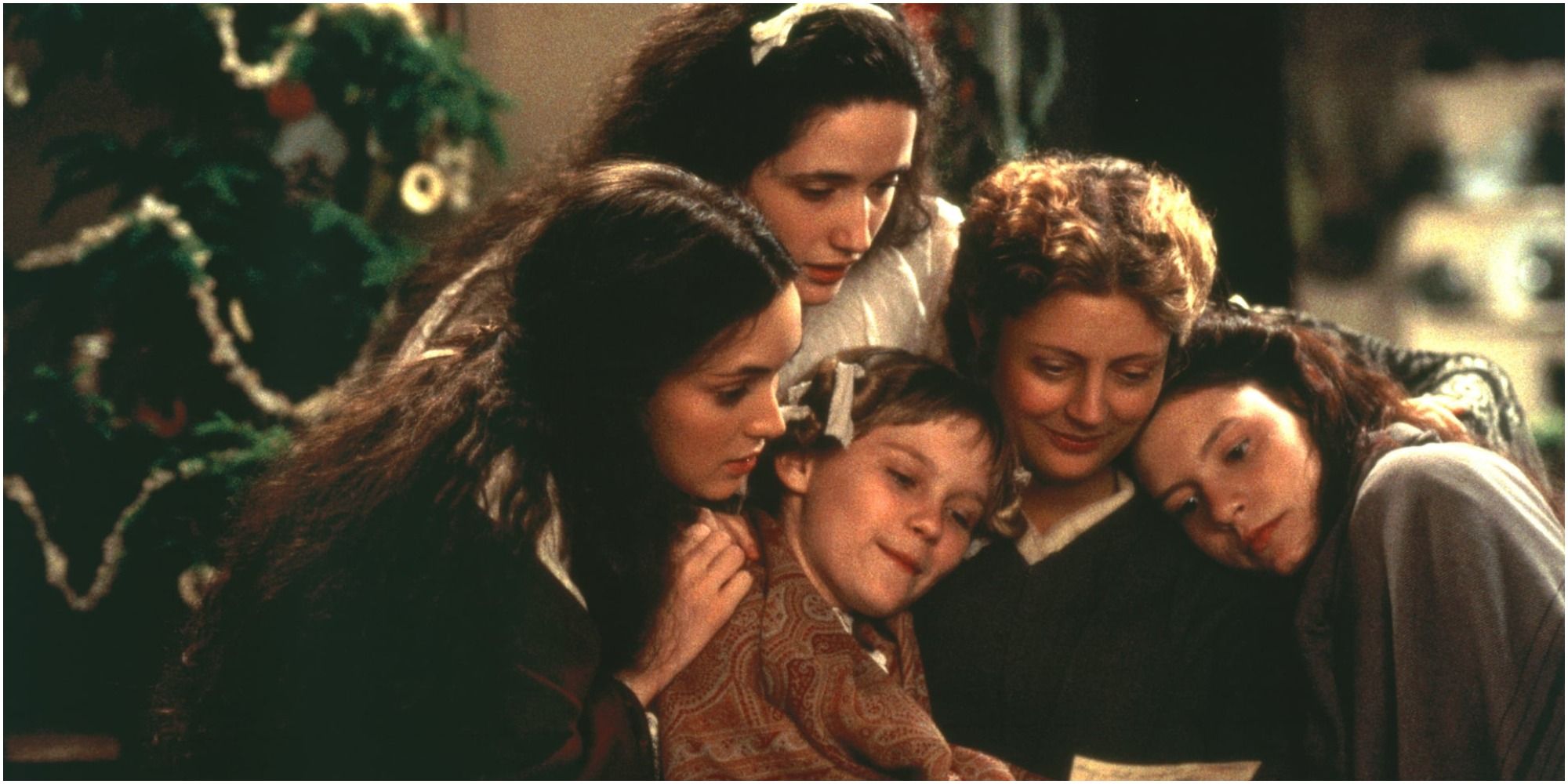 The Marches huddle together in Little Women.