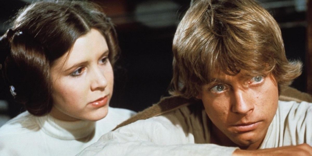 Leia comforts Luke as he mourns Obi-Wan in A New Hope