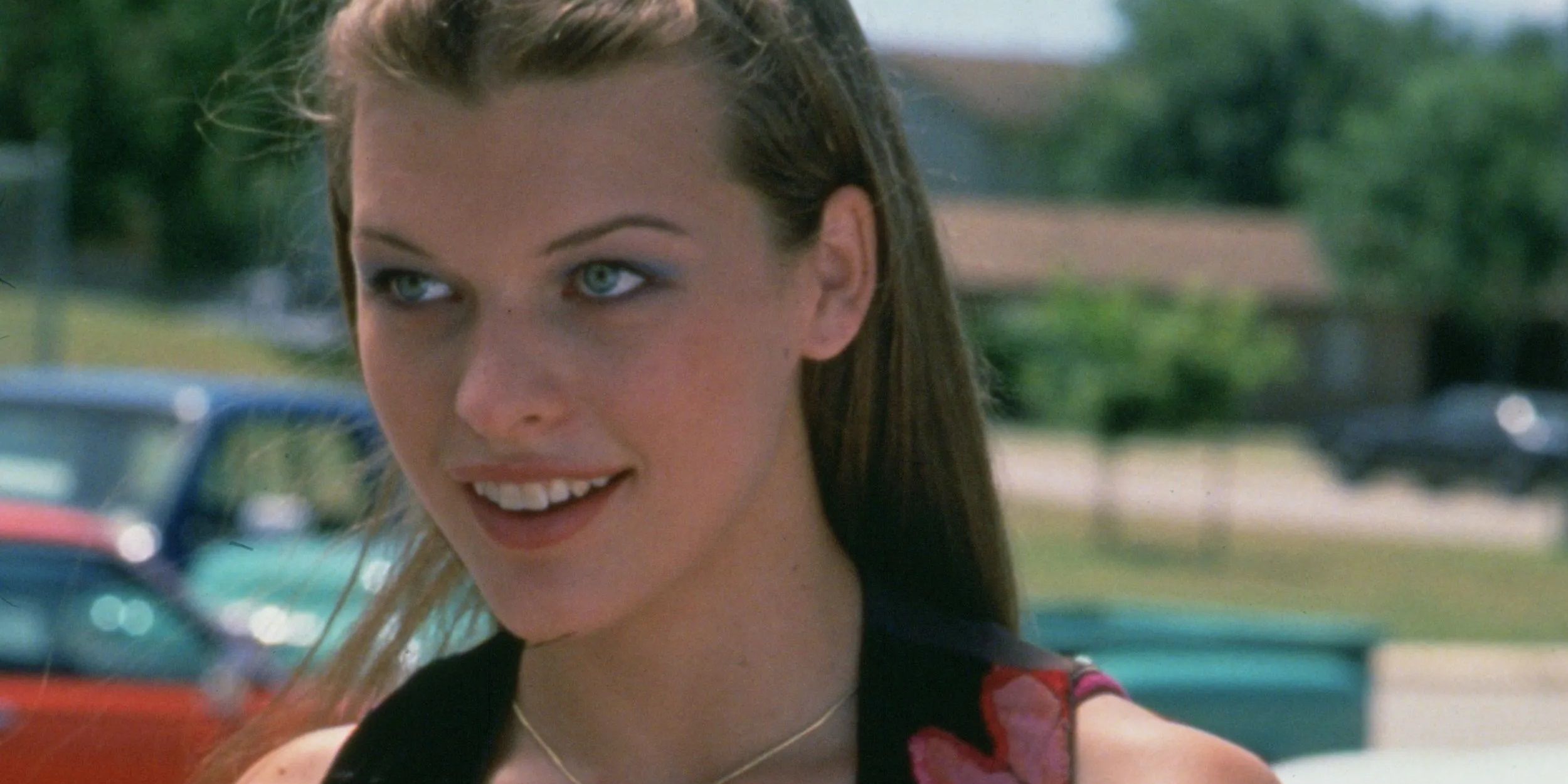 Milla Jovovich in the opening of Dazed and Confused smiling