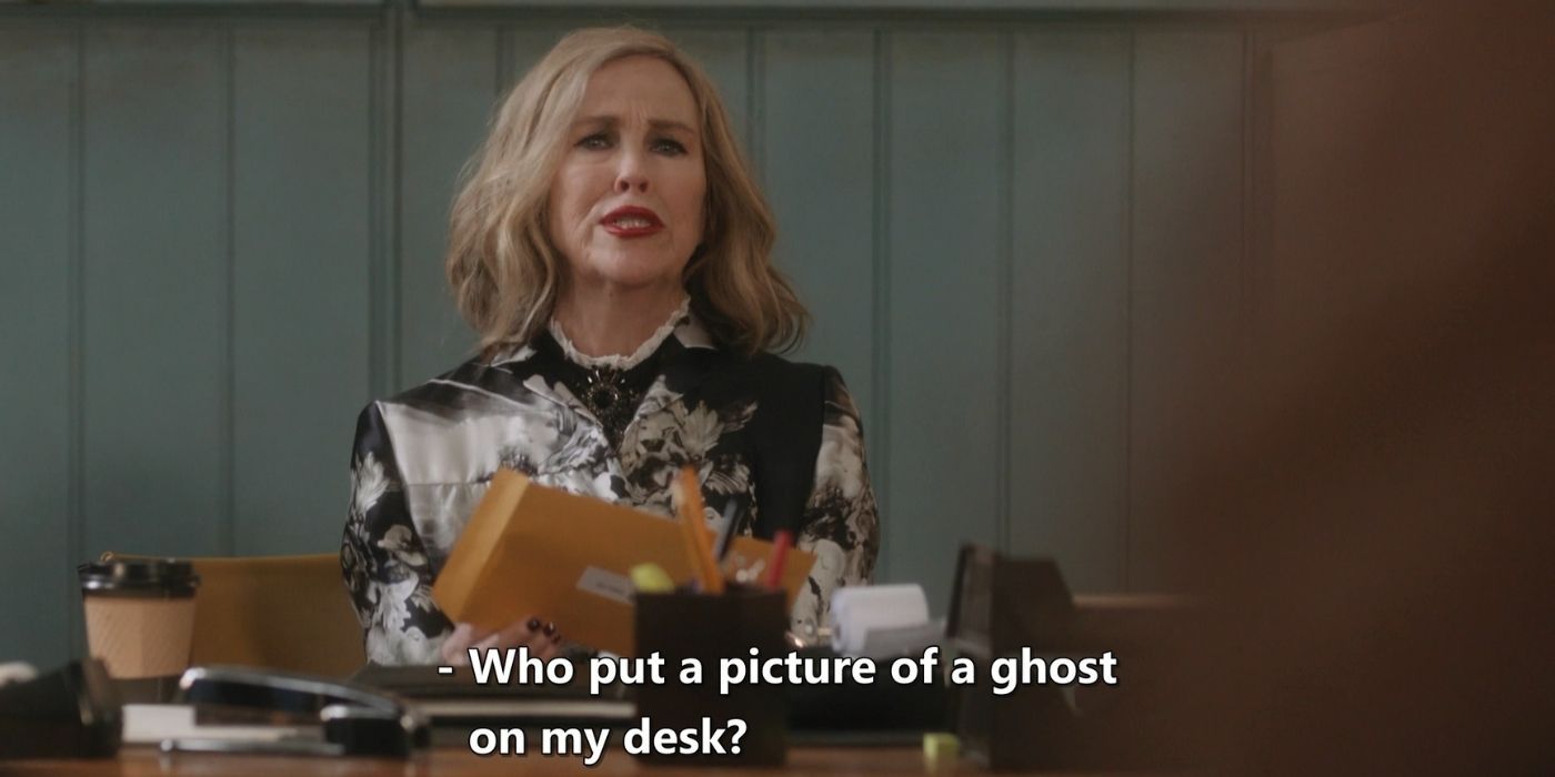 Moira (Catherine O'Hara) asks why there's a picture of a ghost on her desk in Schitt's Creek