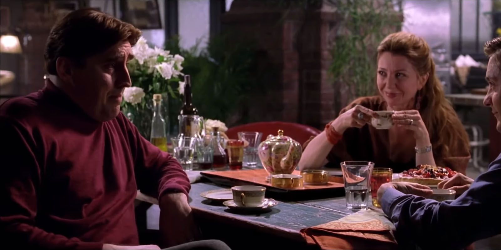 Octavius and his wife sitting at a table in Spider-Man 2