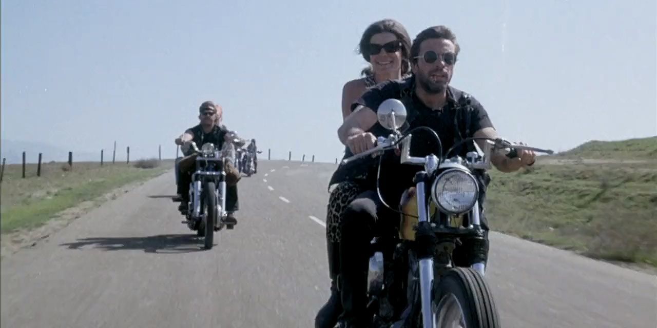 Two couples riding on motorcycles together in Hells Angels On Wheels