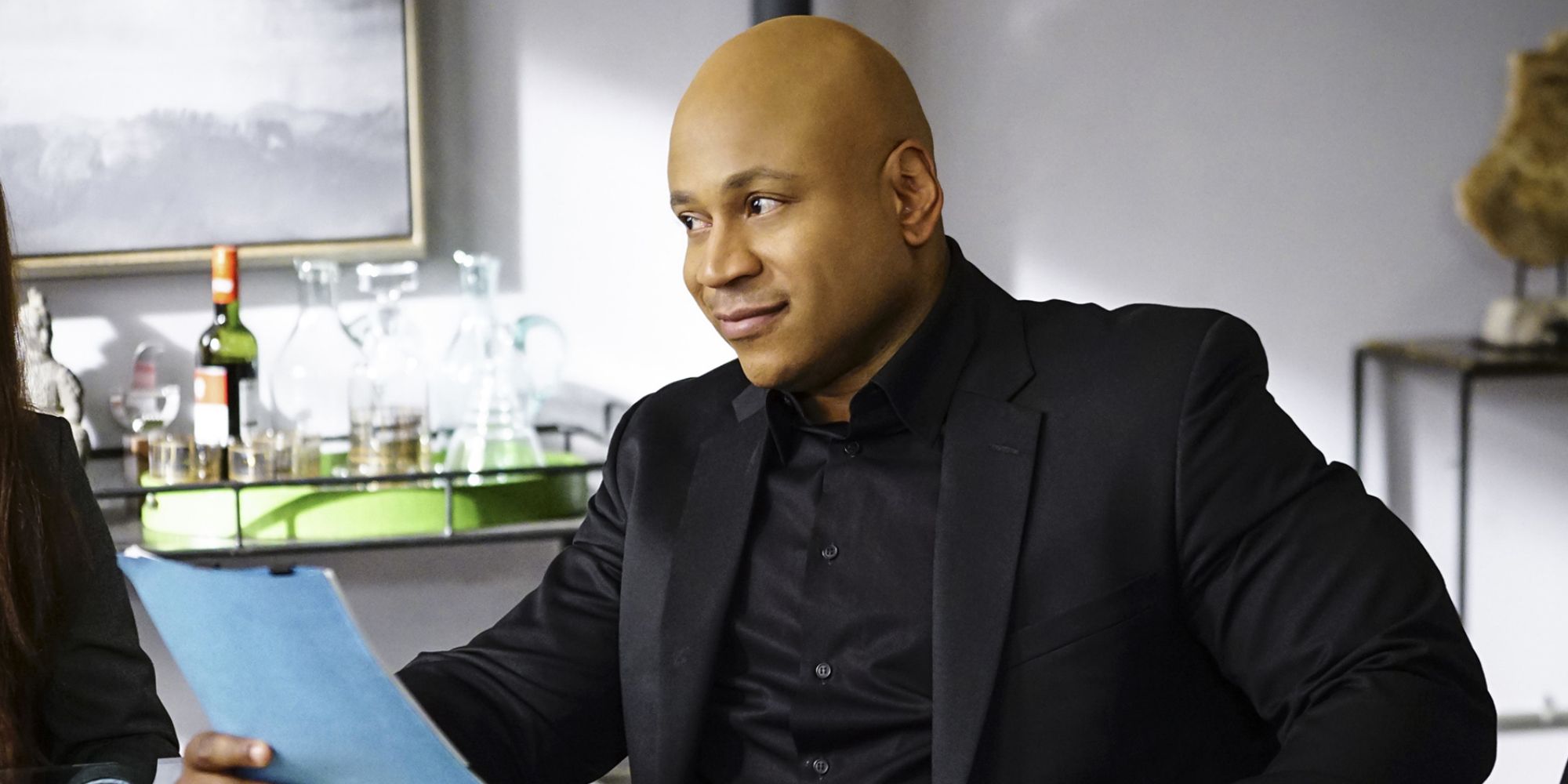 Sam Hanna reading from a paper in NCIS: Los Angeles.
