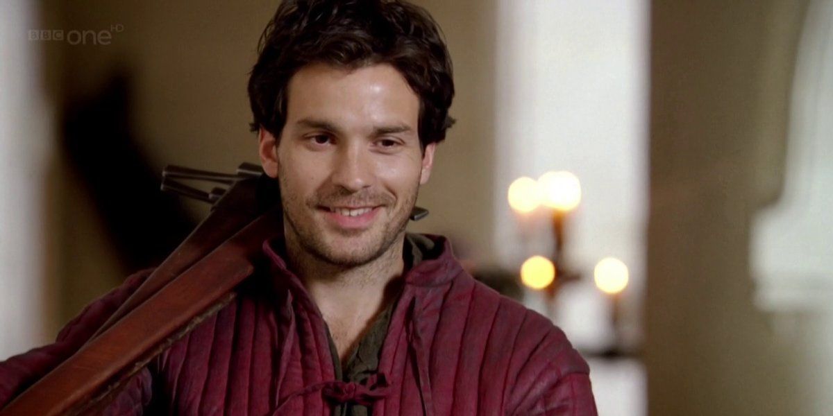 Lancelot, from BBC's Merlin, smiling at the camera