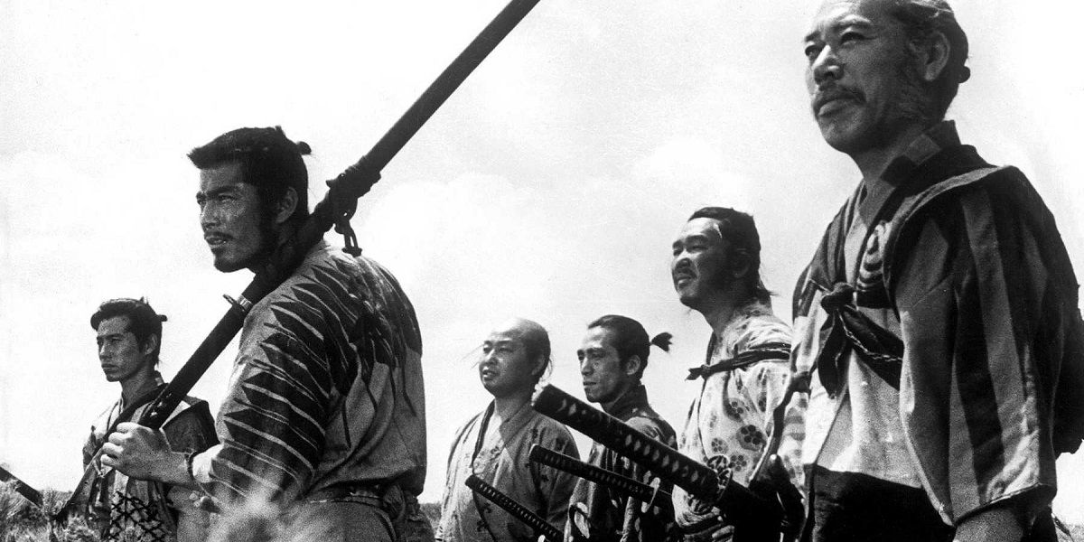 Still from Seven Samurai - a group of men stand ready to attack their enemies