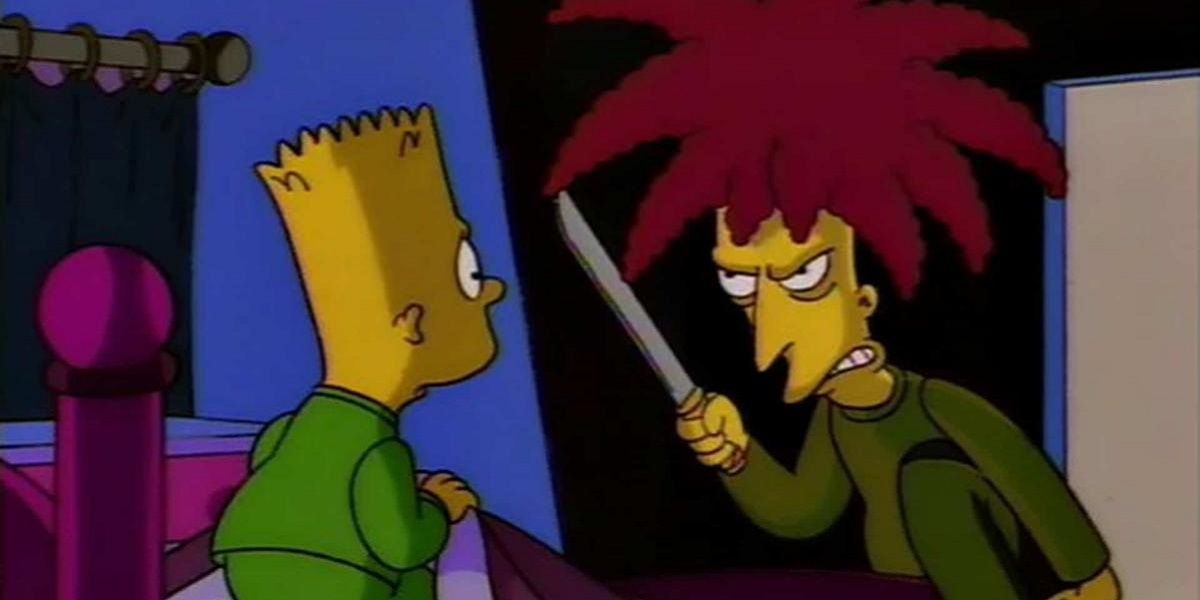 Sideshow Bob holds knife at Bart in The Simpsons