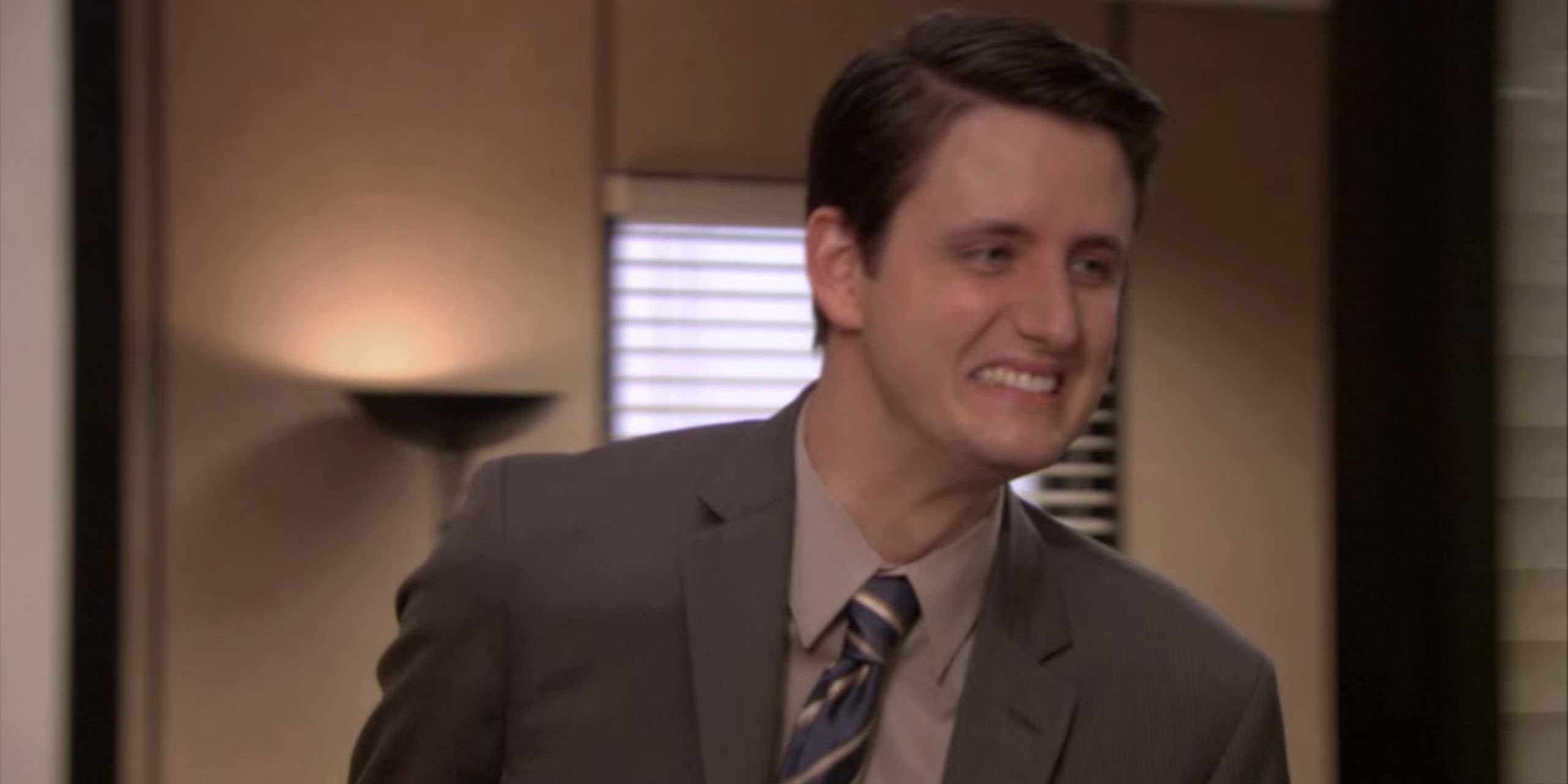 Zach Woods as Gabe Lewis smiling creepily on The Office