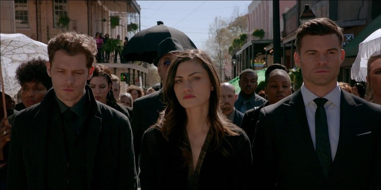 Klaus, Hayley, and Elijah walking down the streets of New Orleans