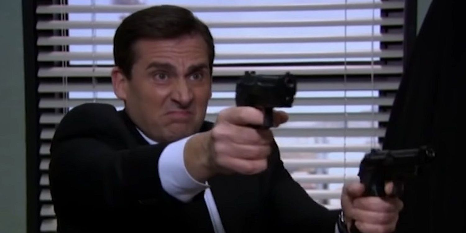 Michael (Steve Carell) firing two guns in The Office